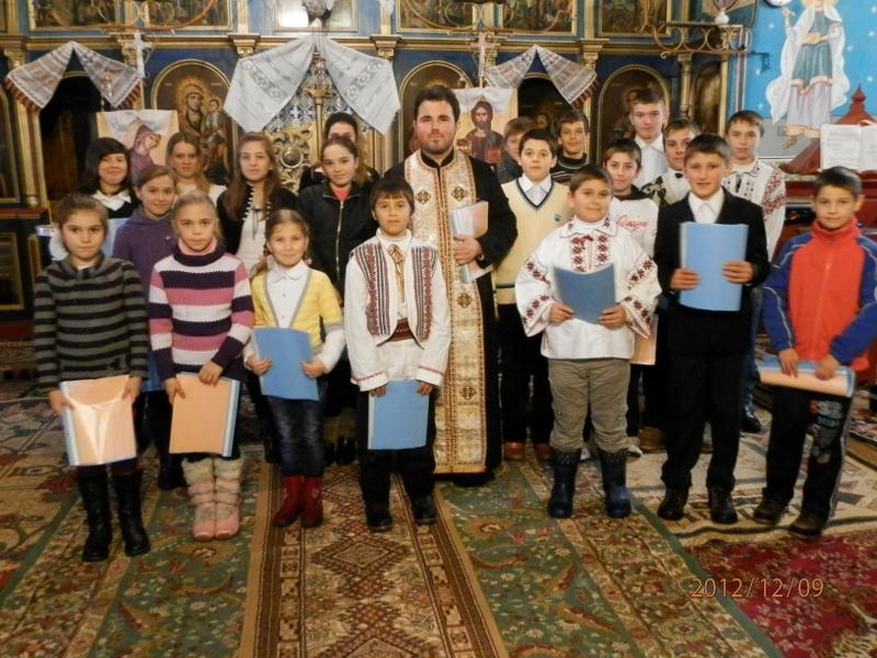 Copiii din Mlenauti colindă pe cei din Baseu 4